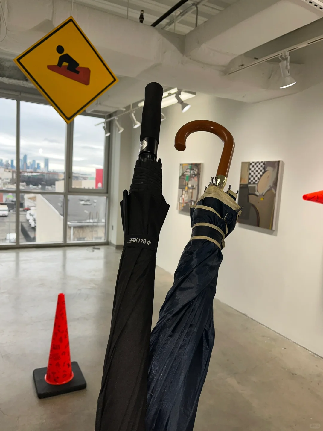 Which two classmates left their umbrellas at the gallery? Maybe you two should just get together!