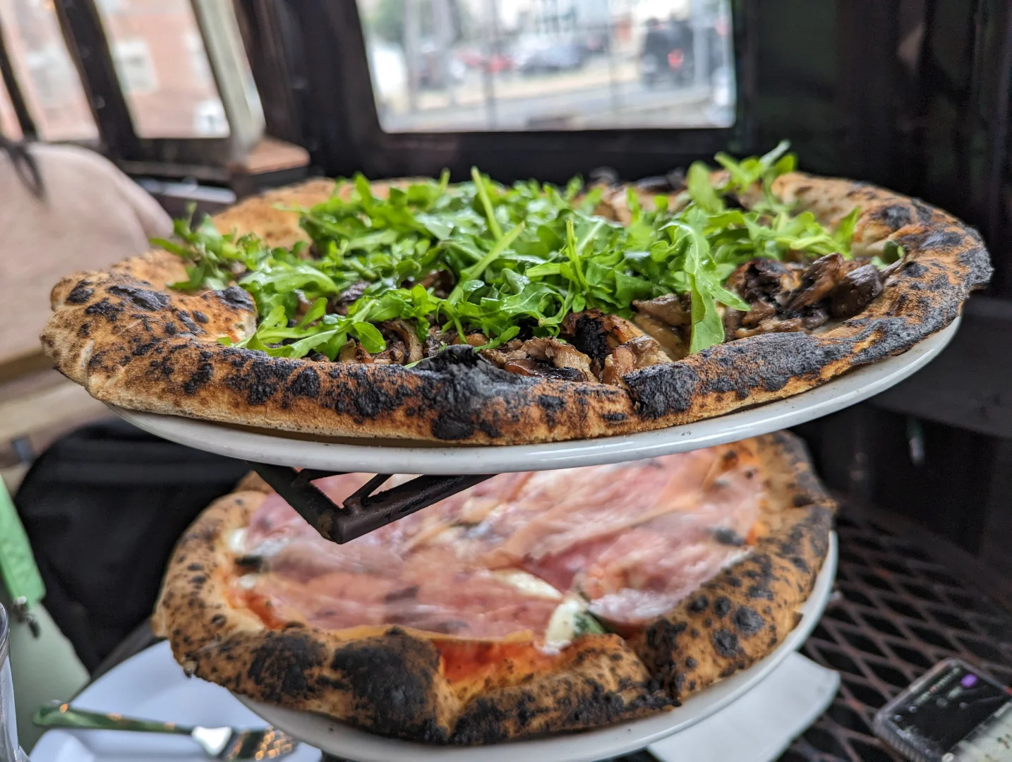 Are there any pizza places in Boston like Pizza Hut or Domino's back home?